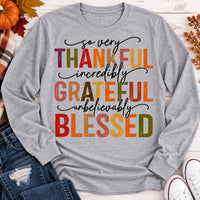 Thankful Grateful Blessed fall graphic long sleeve crewneck tee with colorful autumn lettering