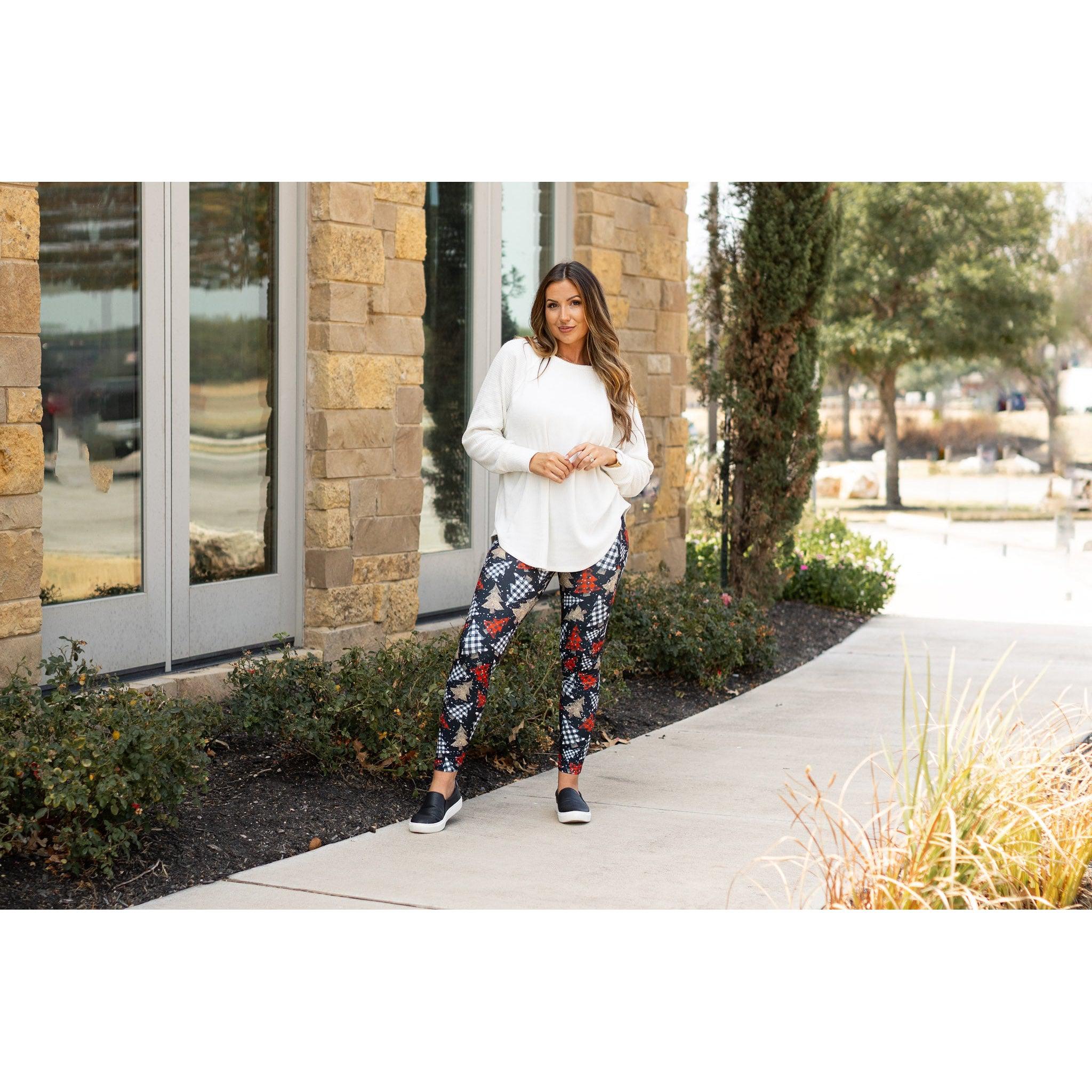 High-waisted Christmas leggings with pockets by Julia Rose.Close-up of Oh Christmas Tree buttery soft leggings fabric and detail