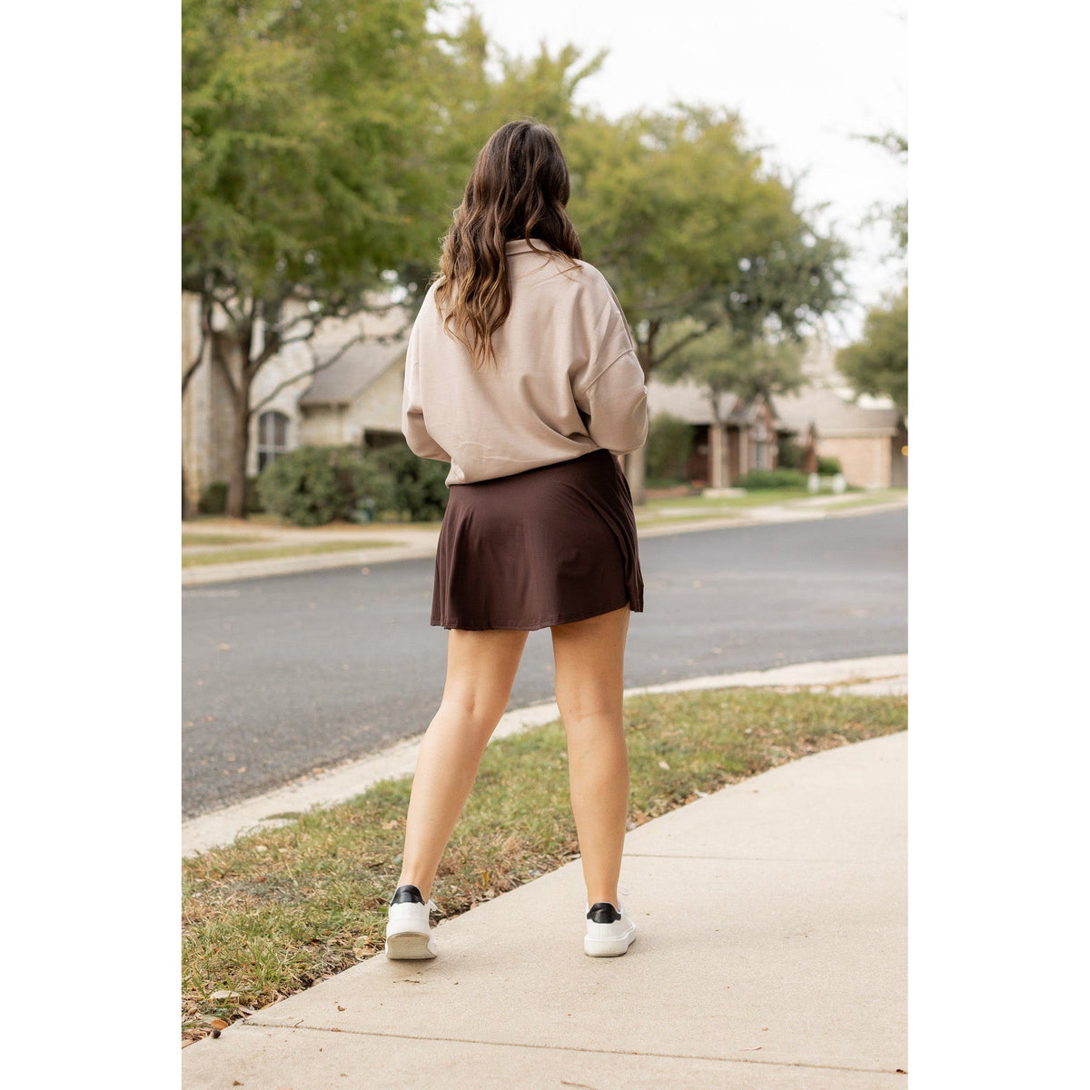 Stretchy brown Julia Rose skort styled for casual wear