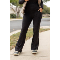 High-waisted black bootcut leggings by Julia Rose, Julia Rose women’s flared black leggings lifestyle image