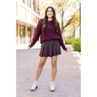Stretchy brown Julia Rose skort styled for casual wear