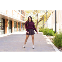 Stretchy brown Julia Rose skort styled for casual wear