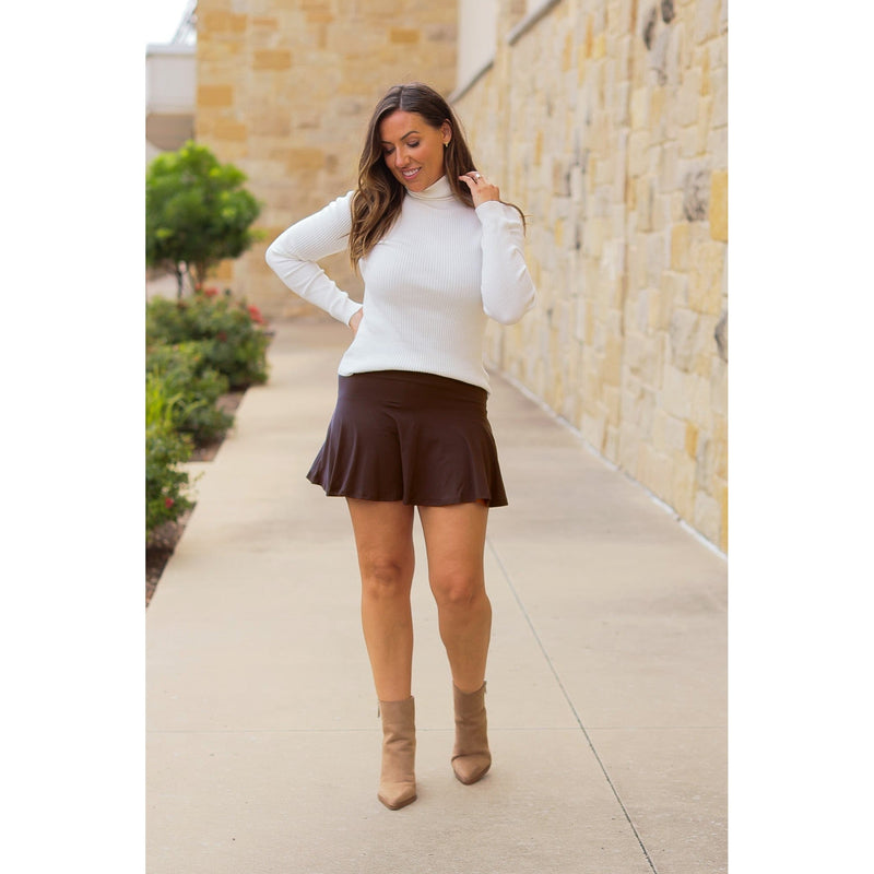 Stretchy brown Julia Rose skort styled for casual wear