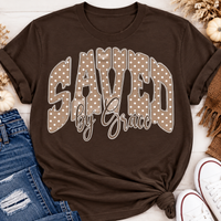 Saved by Grace faith graphic apparel with polka dot lettering, available in brown, navy and black V-neck, long sleeve, crewneck and hoodie styles.