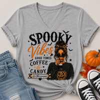 Spooky Vibes Halloween graphic V-neck tee with coffee, candy, pumpkin and leopard print design