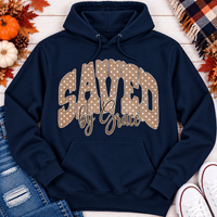 Saved by Grace faith graphic apparel with polka dot lettering, available in brown, navy and black V-neck, long sleeve, crewneck and hoodie styles.