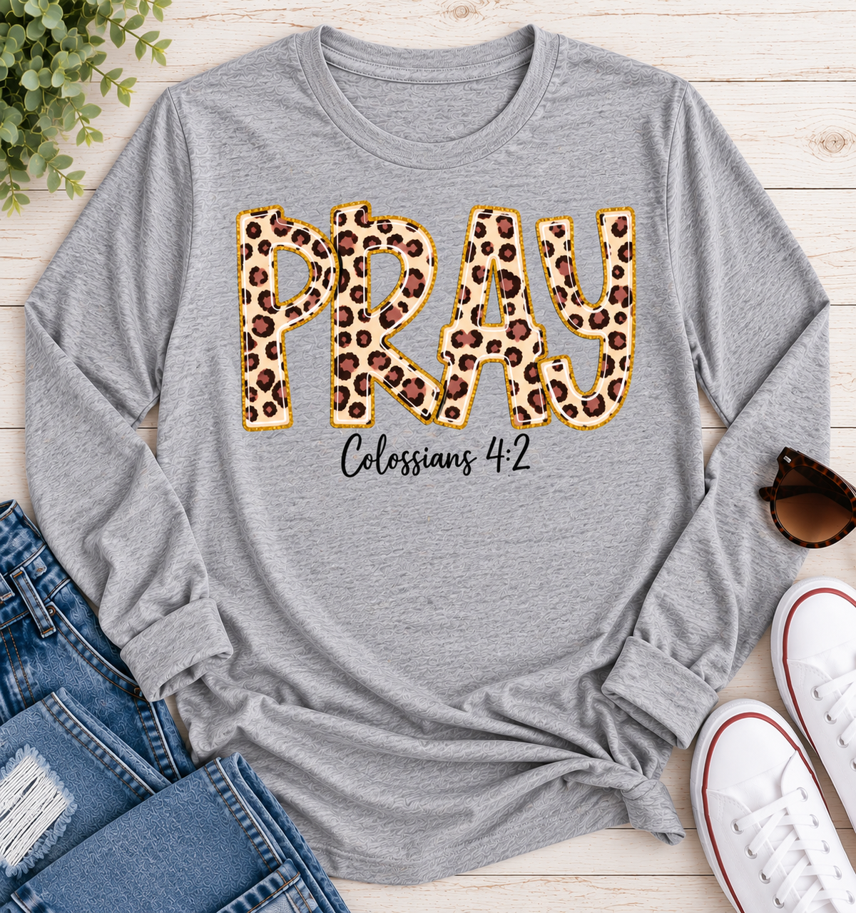 PRAY Colossians 4:2 leopard print Christian graphic shirt available in short sleeve crewneck, V-neck, long sleeve and hoodie styles.
