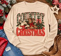 Country Christmas graphic tee with green plaid lettering, red polka dots, cowboy boots, western hat and festive Christmas bows.
