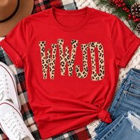 shirt with tan leopard-print WWJD lettering in a rustic holiday flat lay.