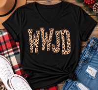 shirt with tan leopard-print WWJD lettering in a rustic holiday flat lay.