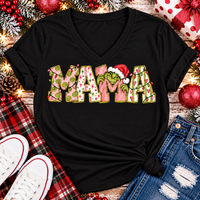 Christmas MAMA graphic shirt featuring pink and green patterned lettering, colorful holiday lights, and a Grinch-inspired character wearing a Santa hat.
