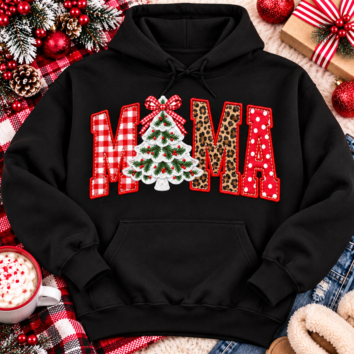 Festive MAMA Christmas graphic apparel featuring bold red gingham, leopard print and red polka dot lettering with a decorated Christmas tree and gingham bow replacing the first A, available in black and red in short sleeve crewneck, V-neck, long sleeve crewneck sweatshirt and hoodie styles.