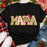 Christmas MAMA graphic shirt featuring pink and green patterned lettering, colorful holiday lights, and a Grinch-inspired character wearing a Santa hat.