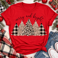 Merry and Bright Christmas graphic apparel featuring leopard print, buffalo plaid and glitter-inspired gold Christmas trees, available in three colors and four styles including crewneck tee, V-neck tee, sweatshirt and hoodie.