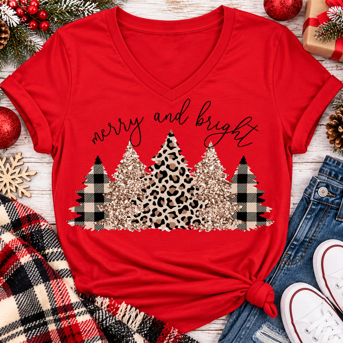 Merry and Bright Christmas graphic apparel featuring leopard print, buffalo plaid and glitter-inspired gold Christmas trees, available in three colors and four styles including crewneck tee, V-neck tee, sweatshirt and hoodie.
