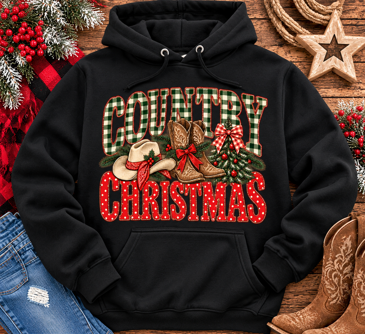 Country Christmas graphic tee with green plaid lettering, red polka dots, cowboy boots, western hat and festive Christmas bows.