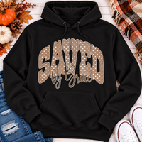 Saved by Grace faith graphic apparel with polka dot lettering, available in brown, navy and black V-neck, long sleeve, crewneck and hoodie styles.