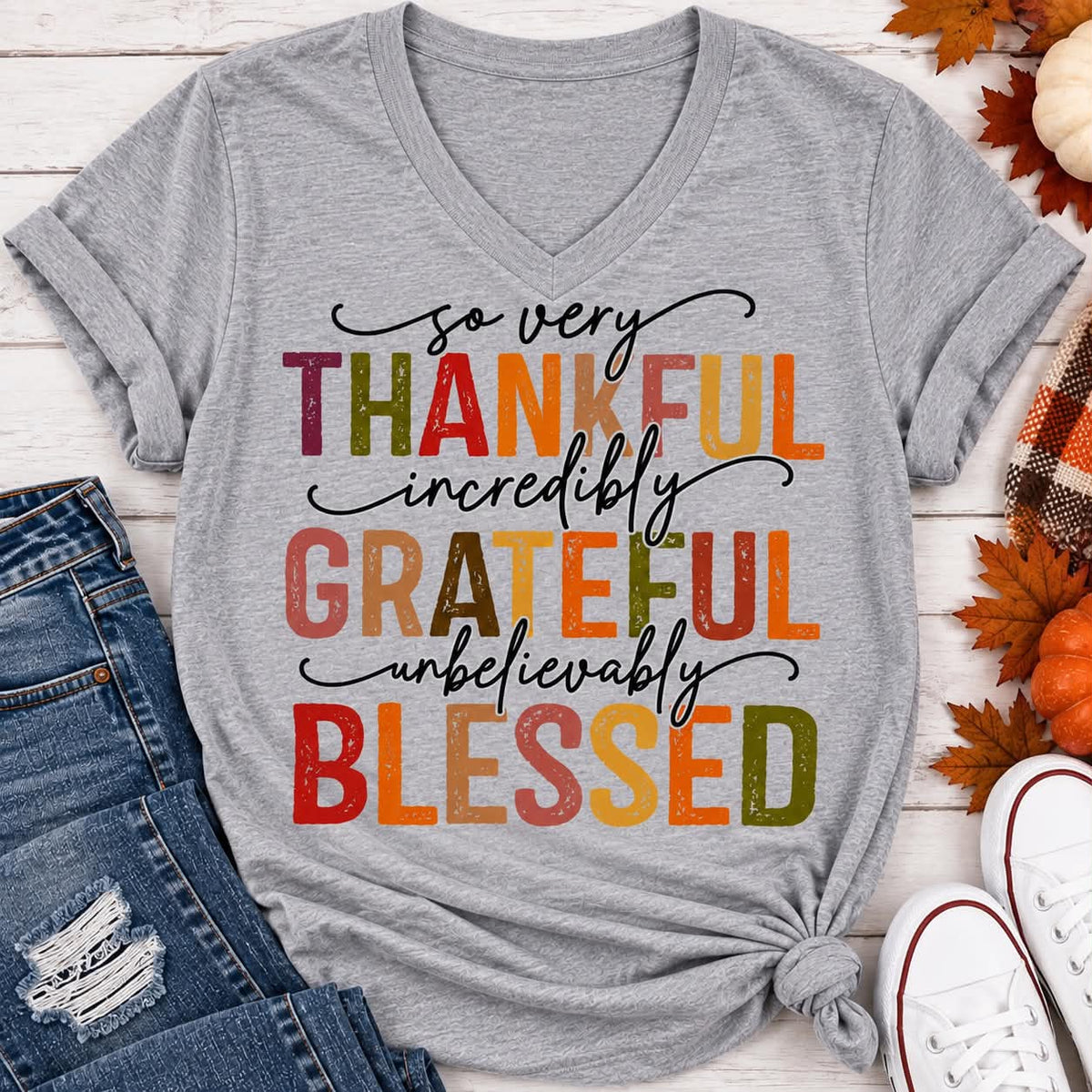 Thankful Grateful Blessed fall graphic v-neck tee with colorful autumn lettering