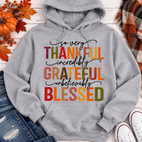 Thankful Grateful Blessed fall graphic hoodie with colorful autumn lettering