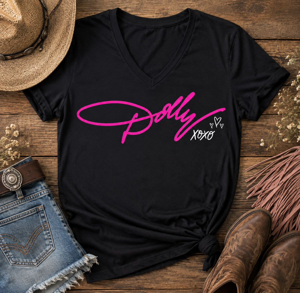 Black Dolly tribute graphic T-shirt featuring bright pink Dolly script with white XOXO and heart details.