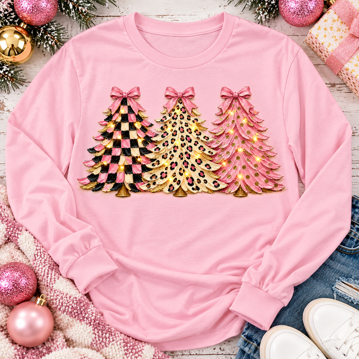 Pink leopard and checkered Christmas trees graphic apparel for women in pink and black