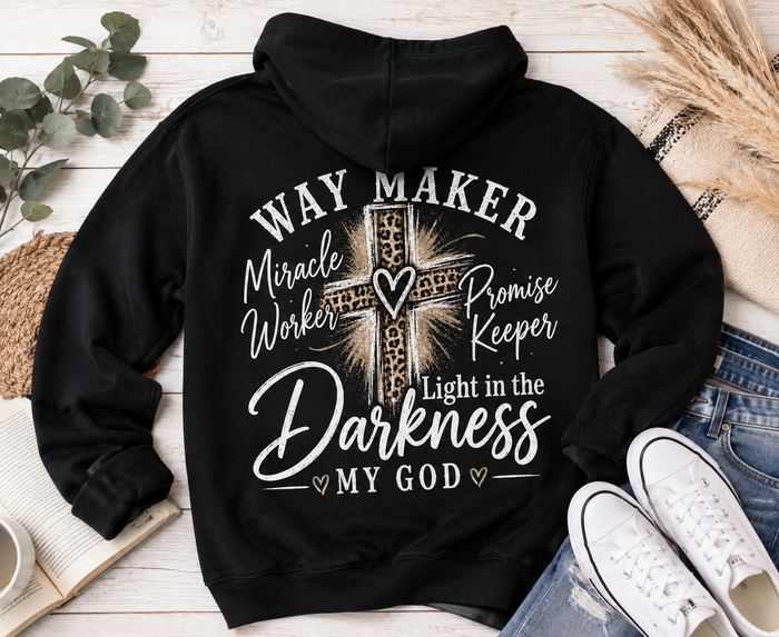 Black hoodie with God heart front graphic and Way Maker leopard cross faith graphic on back