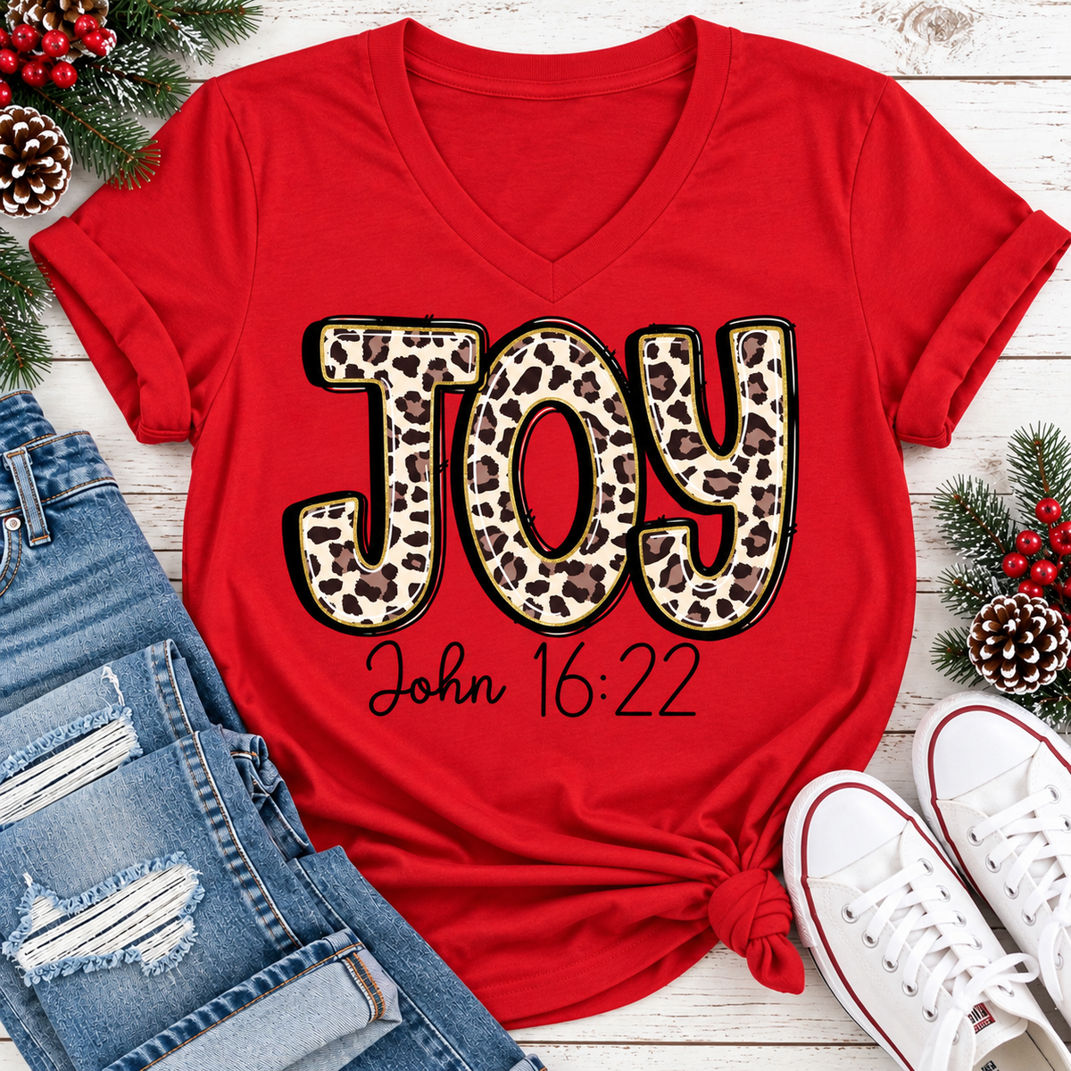 JOY John 16:22 leopard print Christmas graphic apparel available in four styles and two colors.