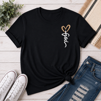 Black crew neck tee with God heart front graphic and Way Maker leopard cross faith graphic on back