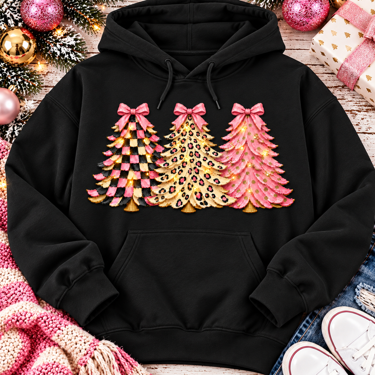 Pink leopard and checkered Christmas trees graphic apparel for women in pink and black